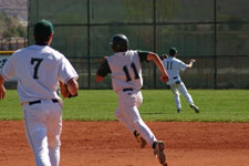 Travis Ayoso heads to second base