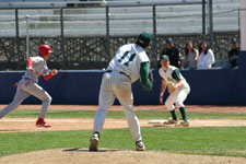 Travis throws the pickoff to first