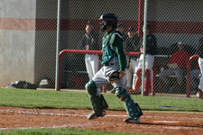 Beasley awaits a play at the plate