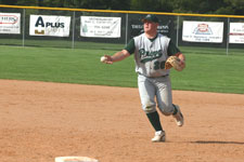 Griner pitches the ball to first